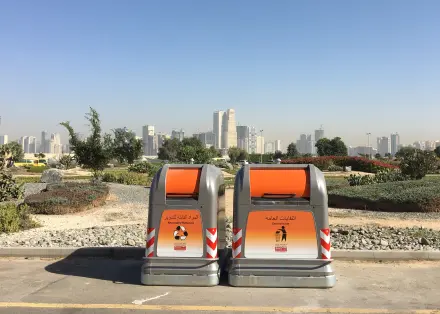 Two containers in a car park